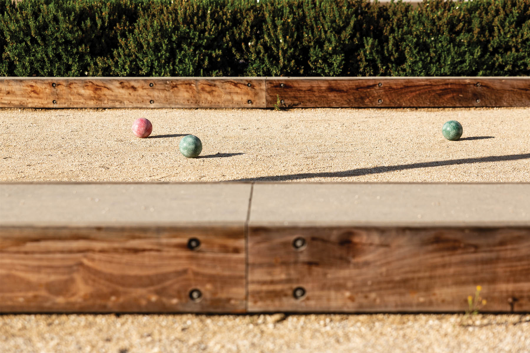 bocce ball court park and paseo apartment community near irvine
