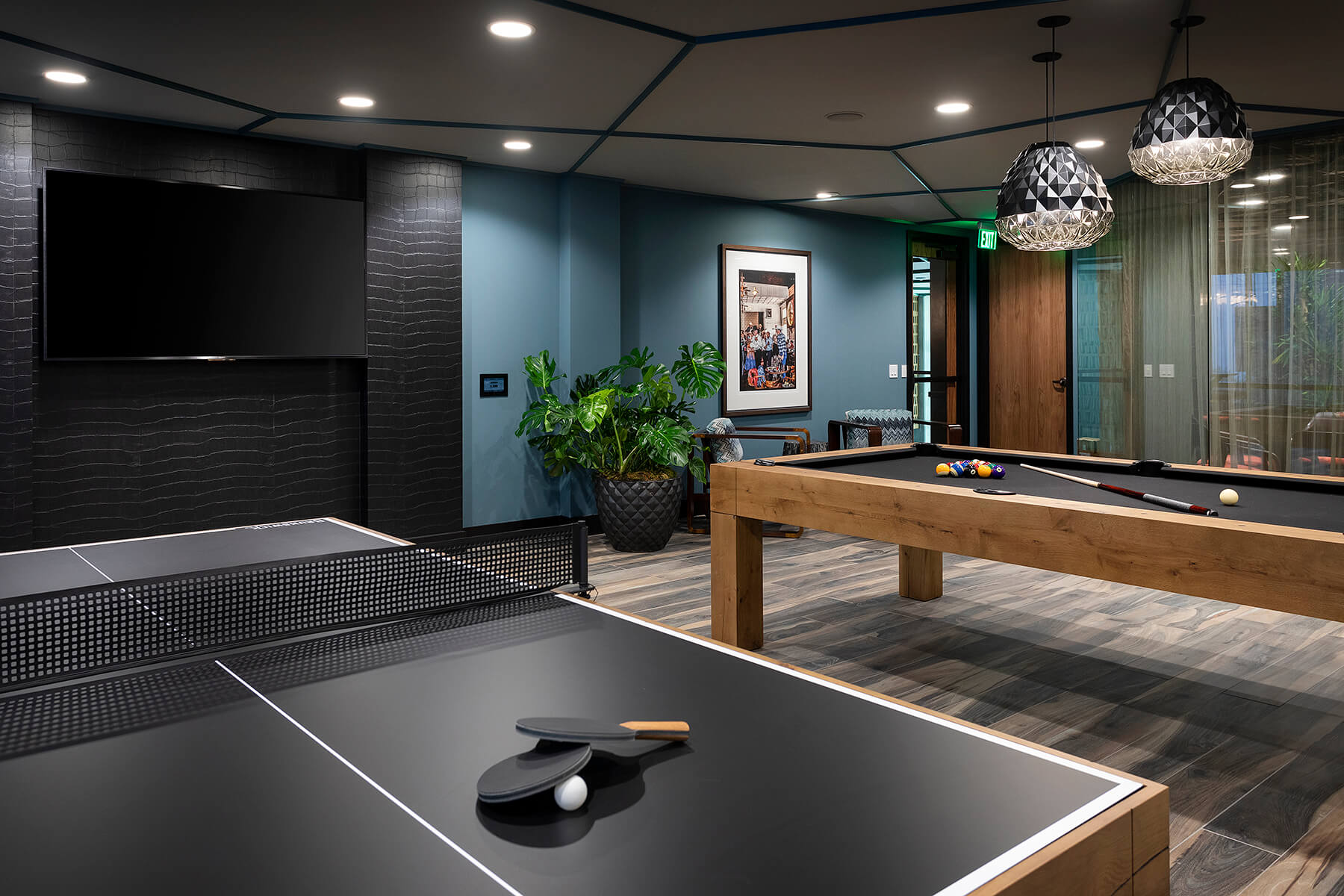 pool table and ping pong table game room at broadstone arden apartments